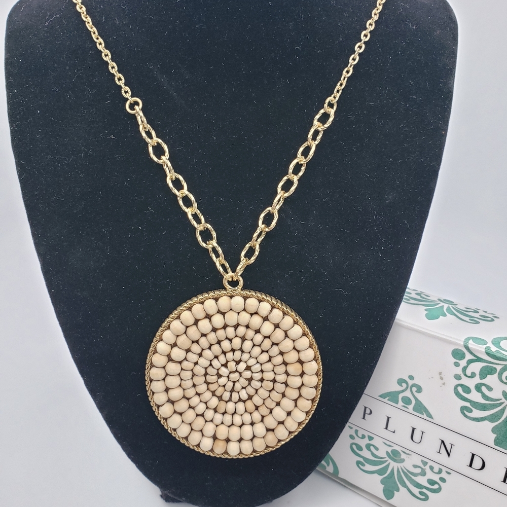 Plunder wood bead medallion with long chain